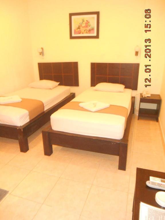 Parma Panam Hotel Pekanbaru Habitación foto